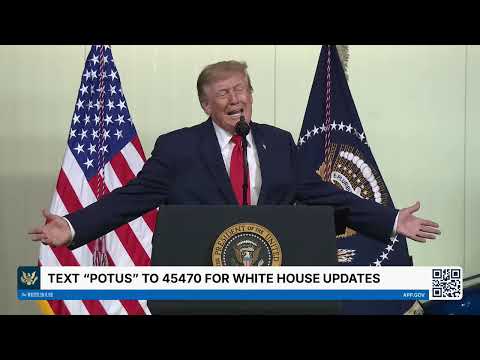President Trump speaking at a podium during a site visit